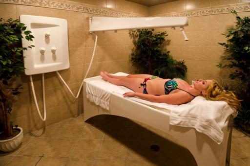 Woman laying in a spa room